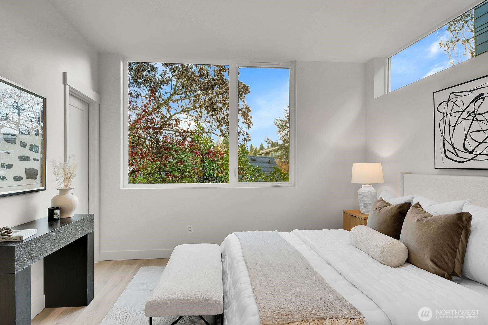 Comfortably sized Primary Bedroom Suite with walk in closet