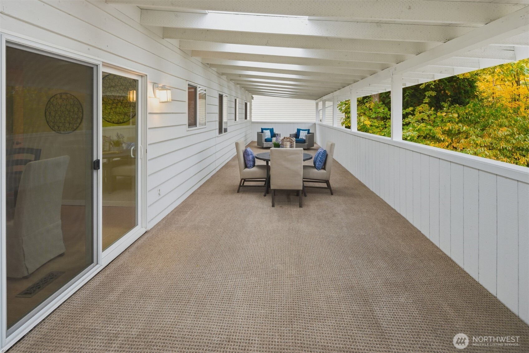 An entertainers delight with this HUGE covered and carpeted deck with 14 skylights!