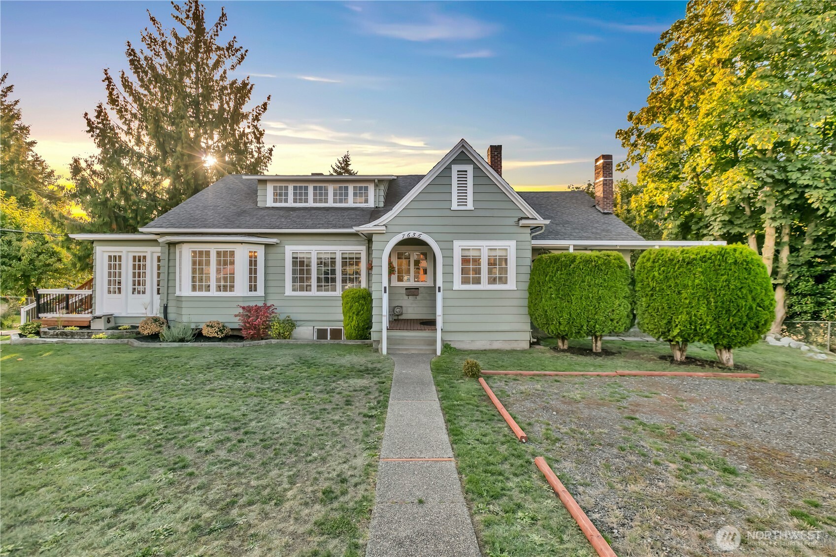 Inviting façade & arched entry