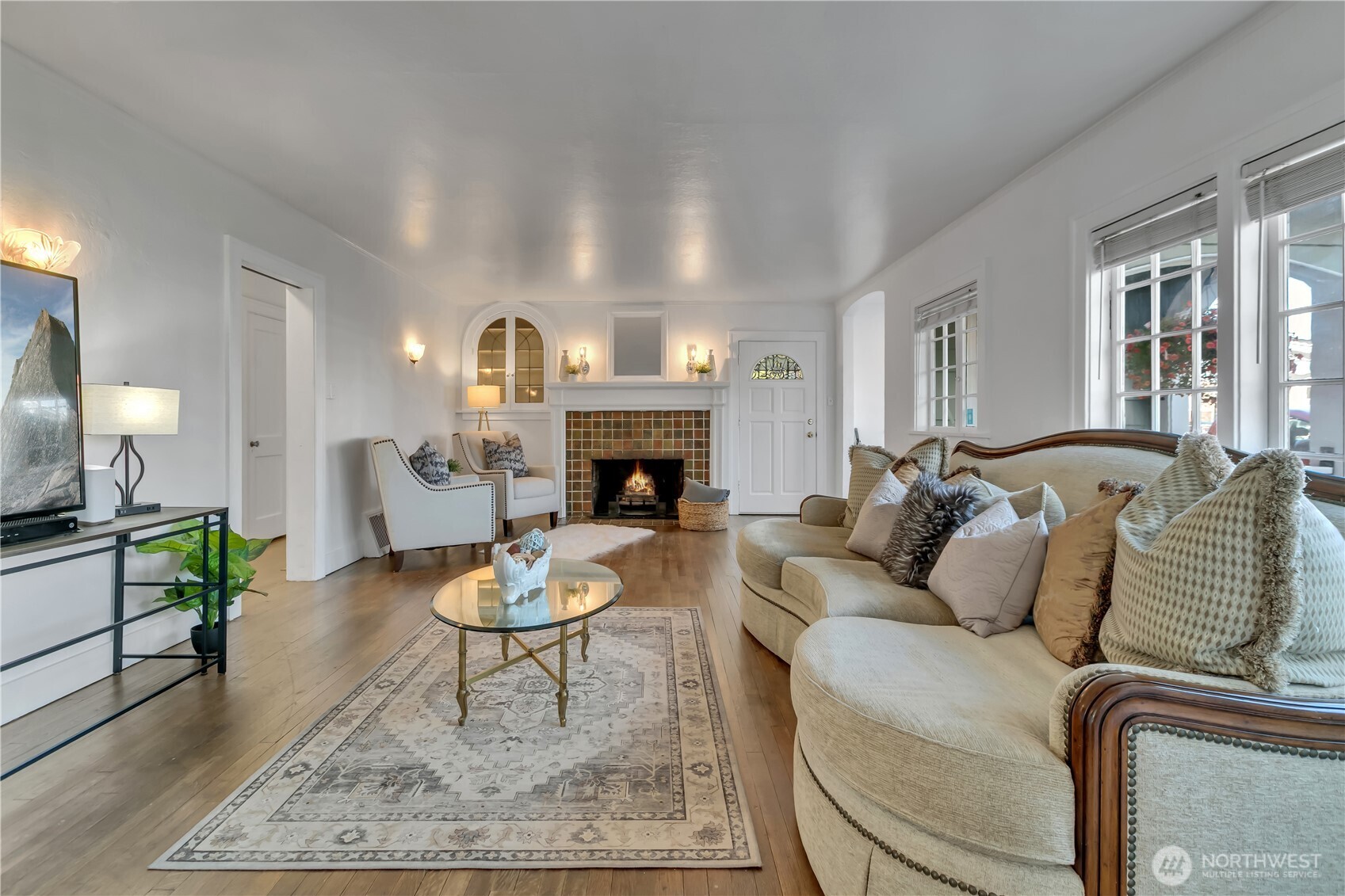Large, light-filled living room allows multiple seating arrangements.