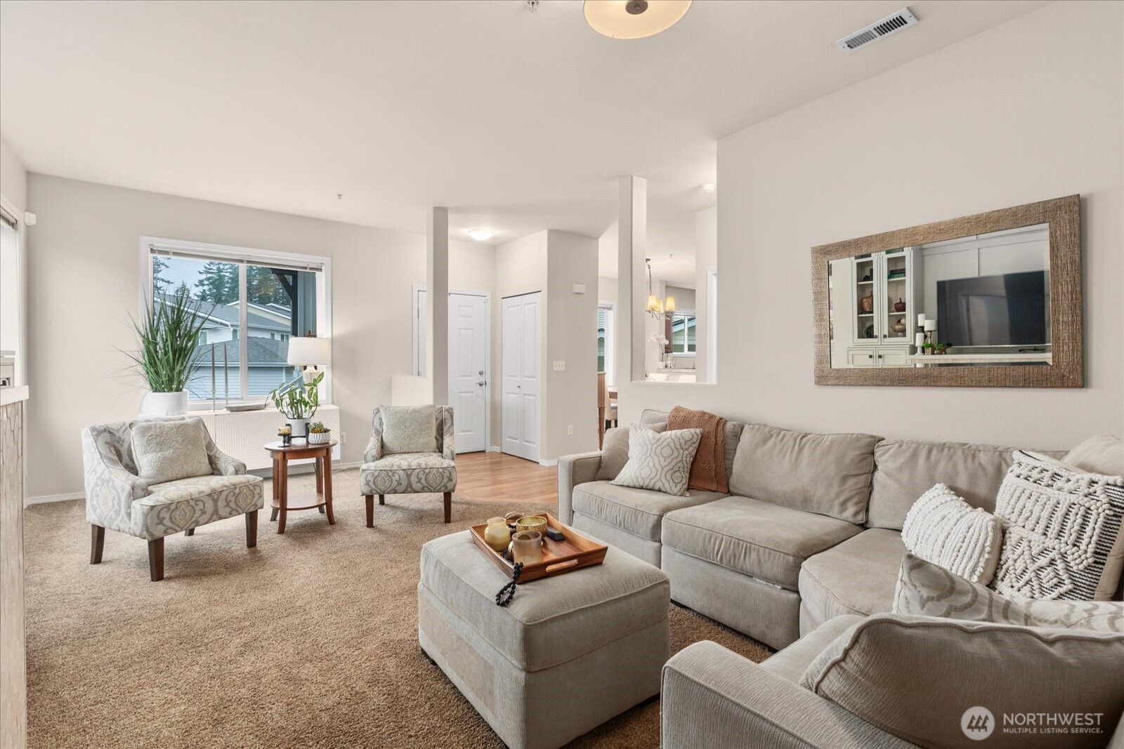 Spacious living area with electric fireplace