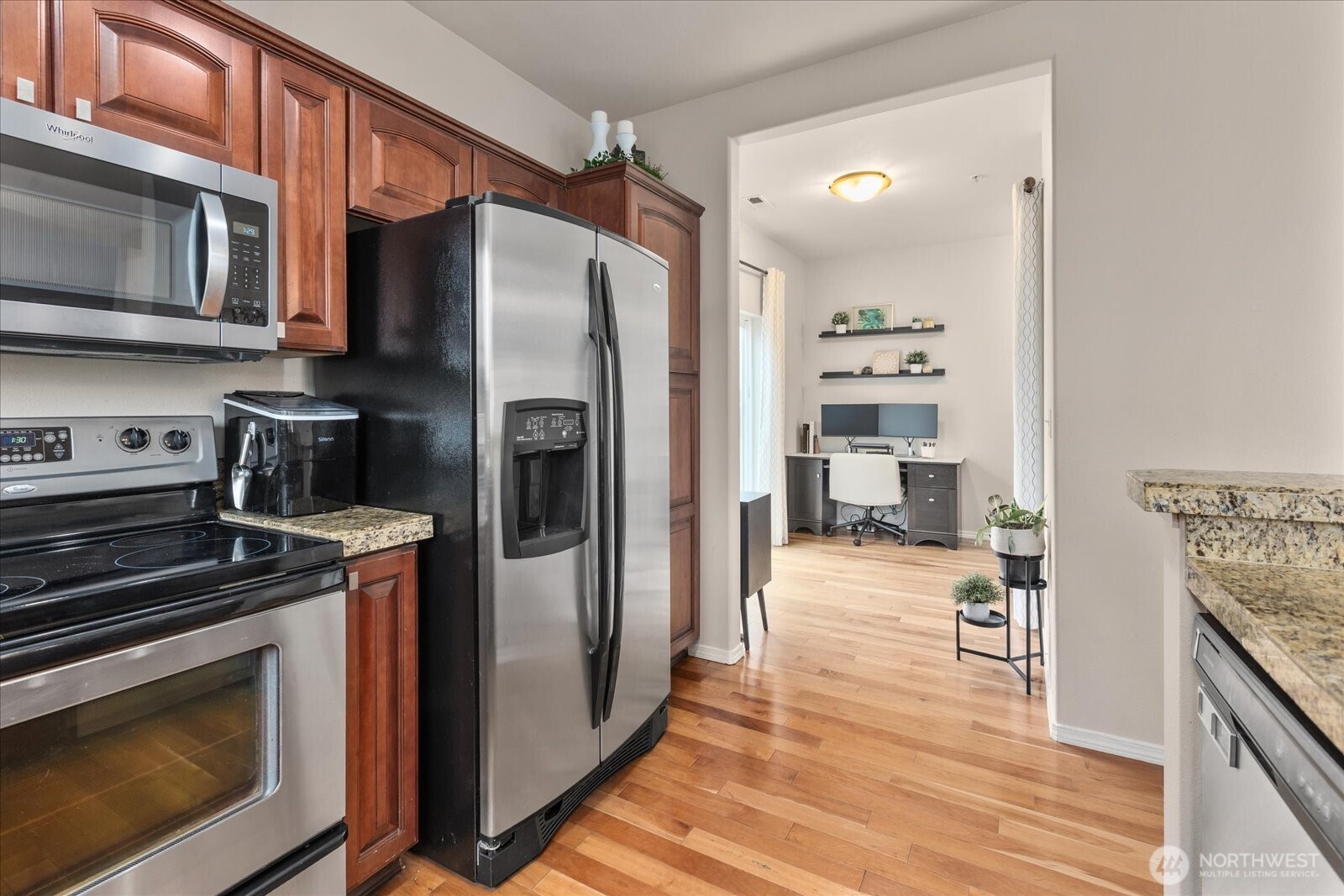 Adjacent to the kitchen is a bonus space