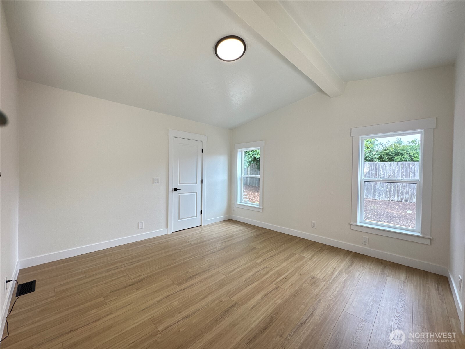 Primary bedroom. Door to walk in closet.