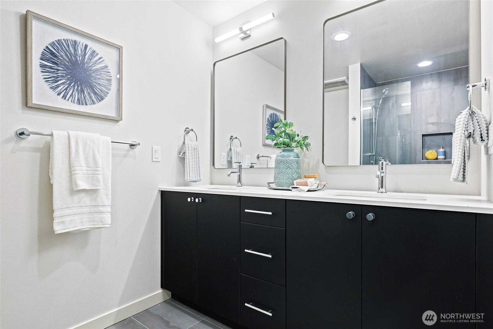 Dual vanities, modern lighting, and room to spread out — this primary bath brings spa energy home.