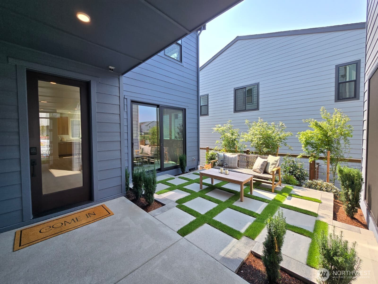 Entry into courtyard from front of home.