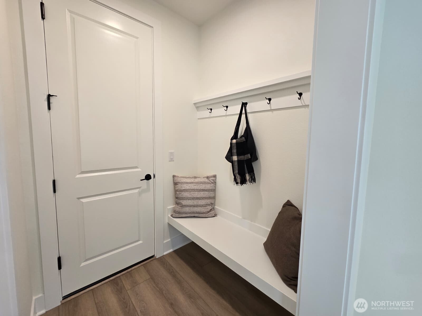Mud Room next to garage's entrace to home across from Powder Bath.
