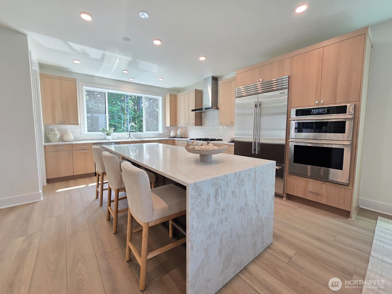 At the kitchen sink, you'll be looking into your backyard, and greenbelt.