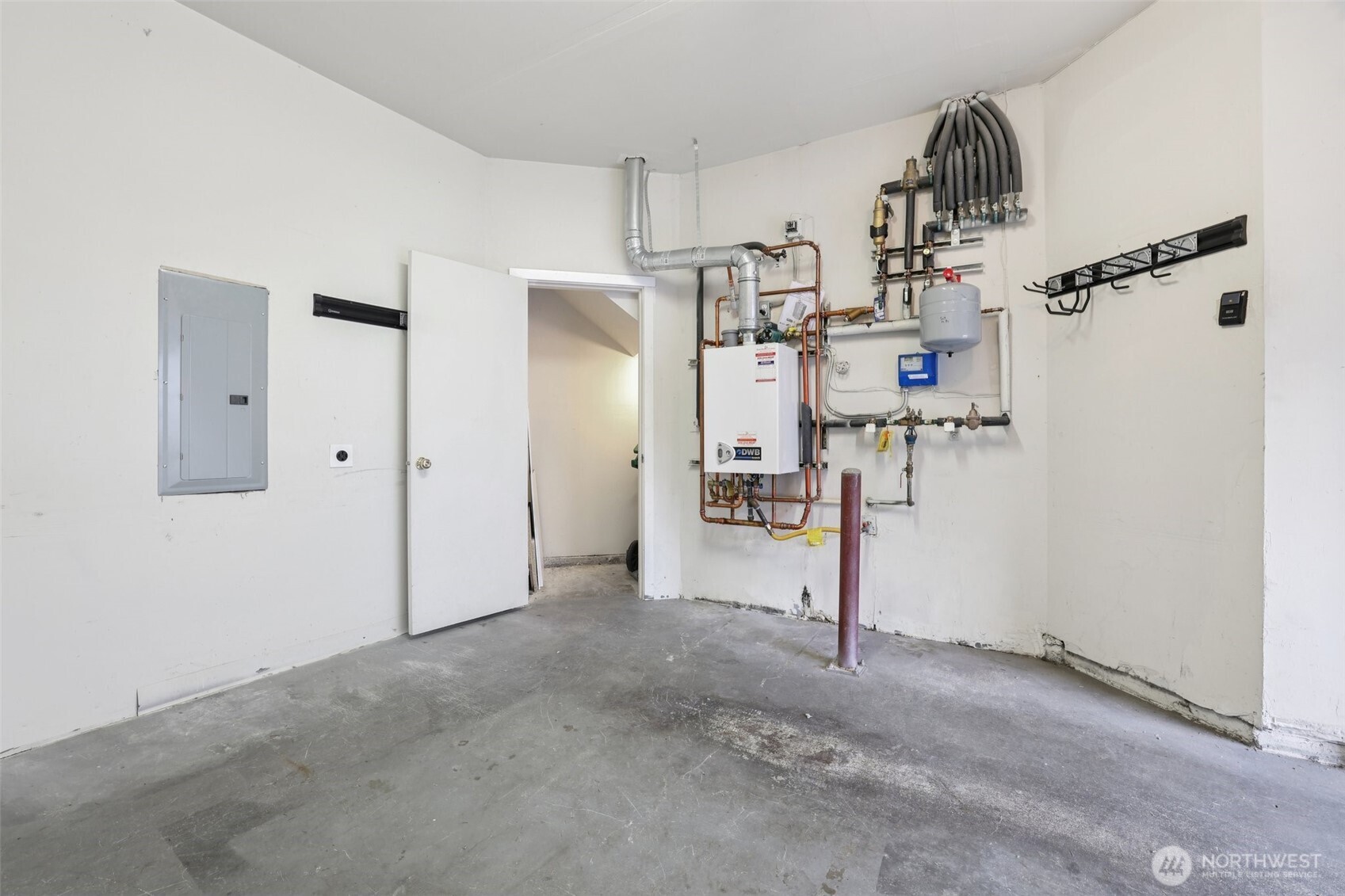 Storage Closet, EV Charger and Gas Boiler for heat and water.