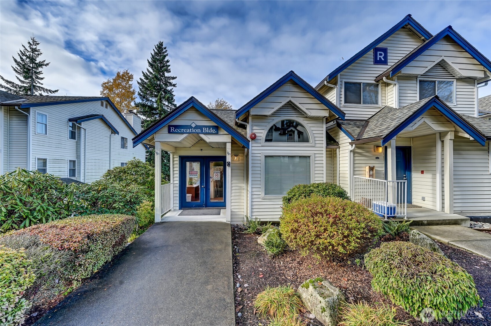 rec building a few steps away from patio