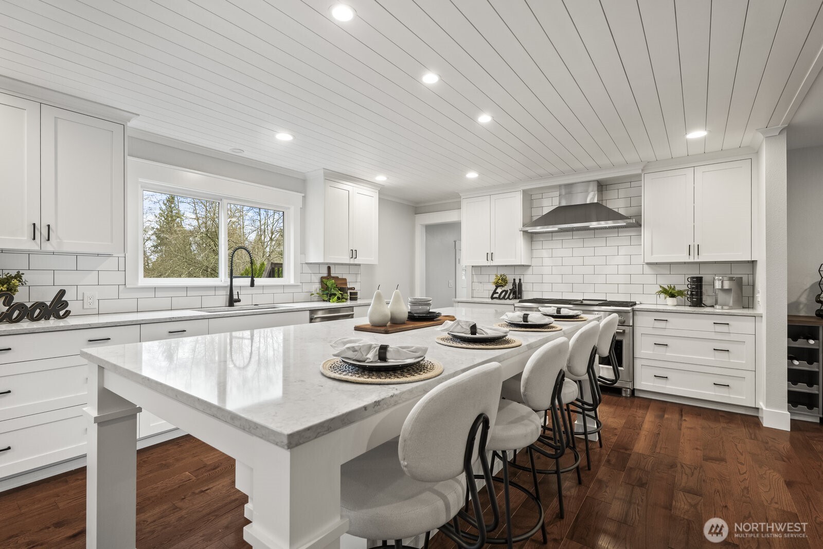 Updated chefs kitchen with stainless steel appliances and extra large center island