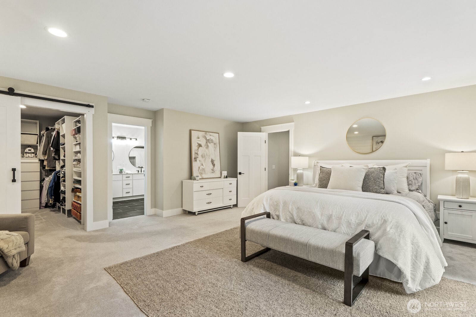 Another view of the primary bedroom