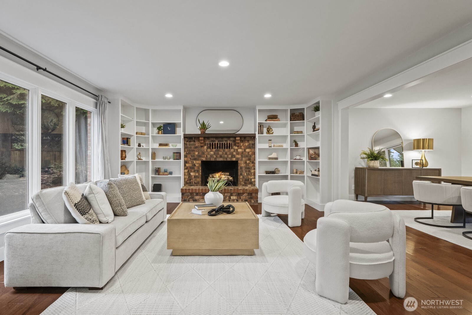 This versatile room can be used as a library, dining room, or for expanding the dining room during large get togethers. There is a wood burning fireplace as well