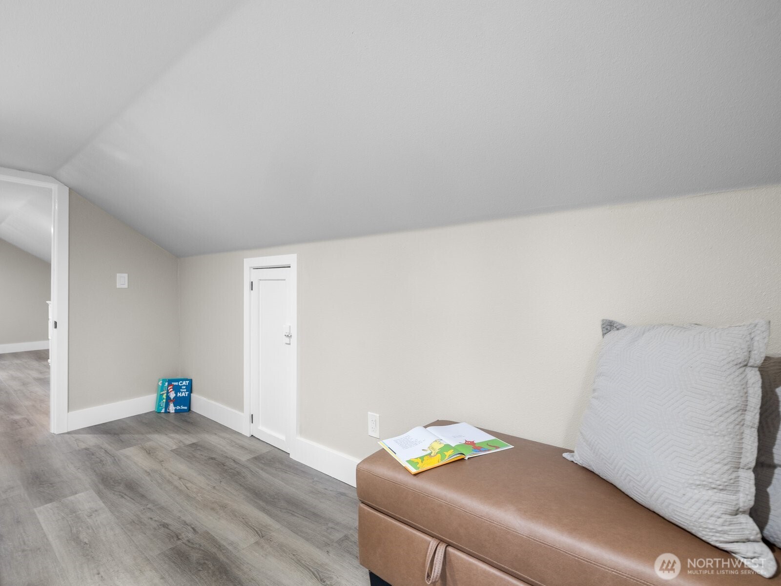 Upstairs sitting nook    perfect for a cozy reading area or play room