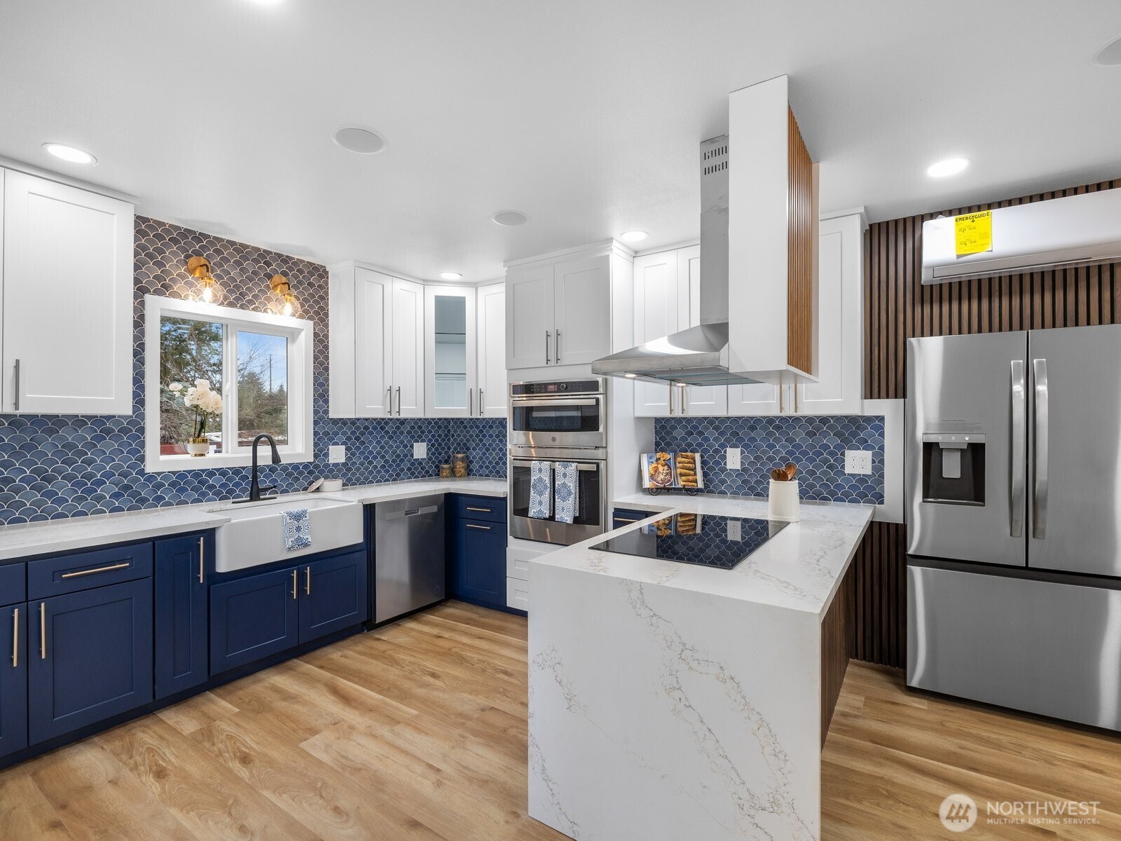 A truly gourmet kitchen, with tons of lighting, high end appliances and custom touches.