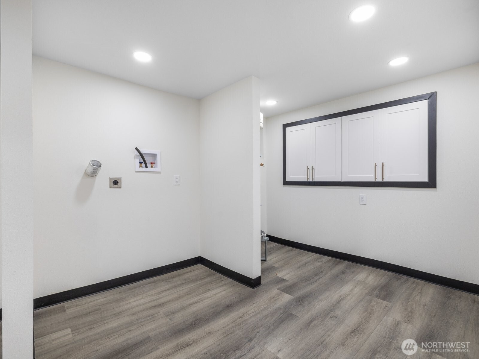 Lower level fully finished basement with washer-dryer hook-ups and built in storage