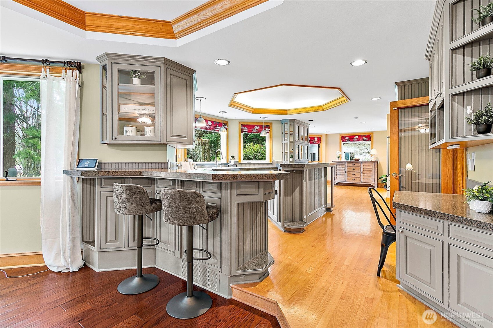 Kitchen with island bar for extra sitting space.
