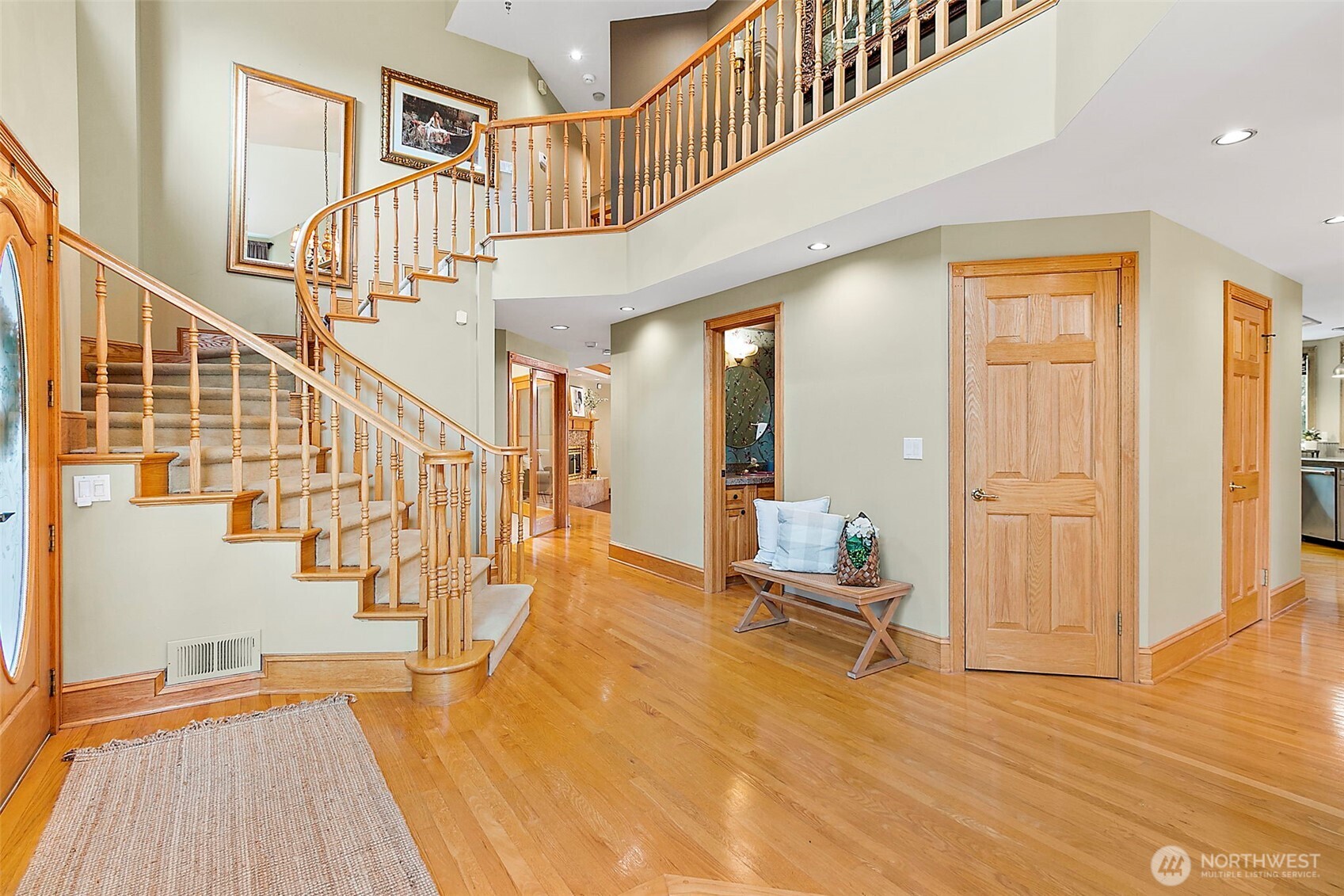 Grand staircase with balcony style stairwells.