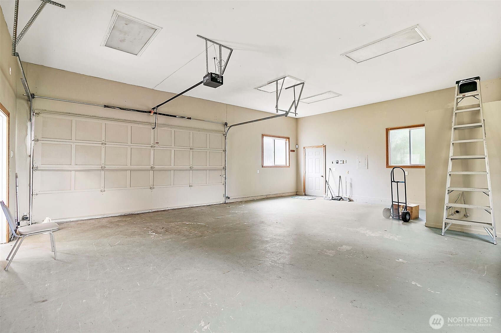 Deep garage space inside shop.