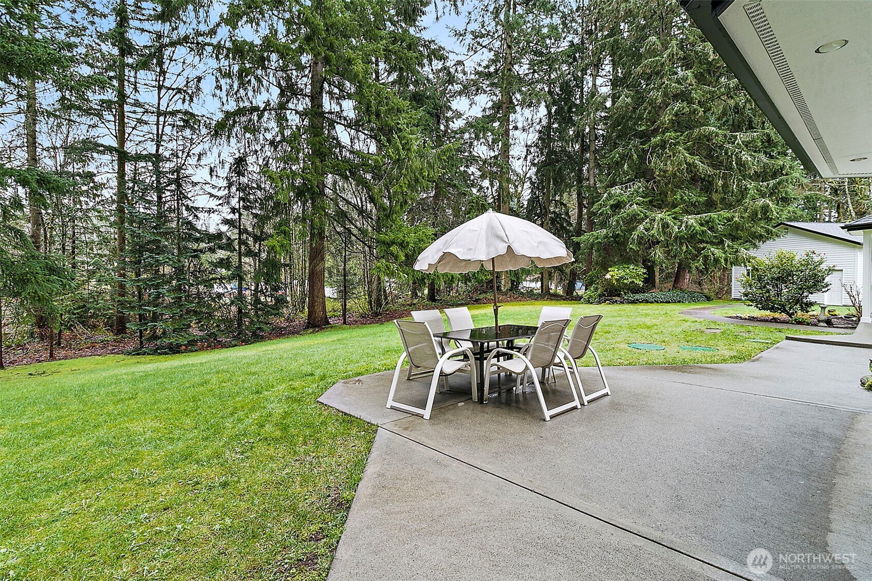 Backyard with forest view.