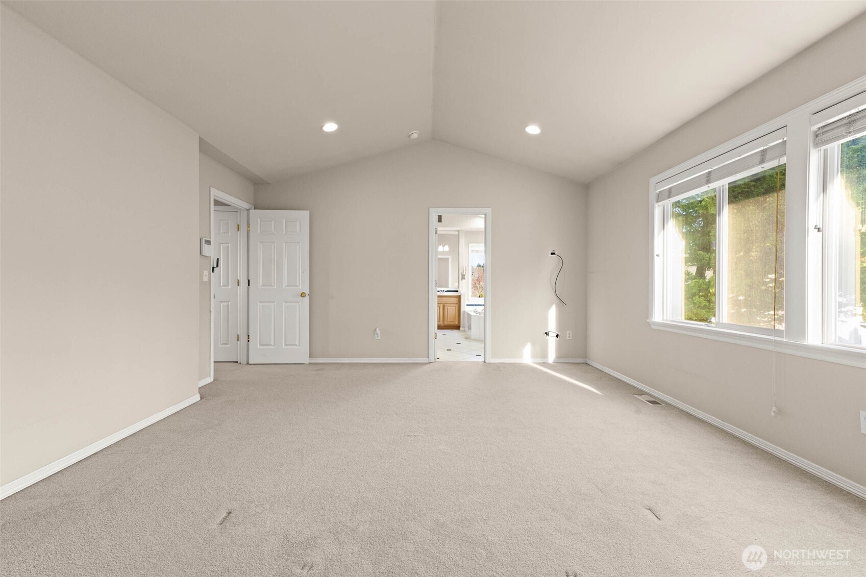 Primary Bedroom with Vaulted Ceiling