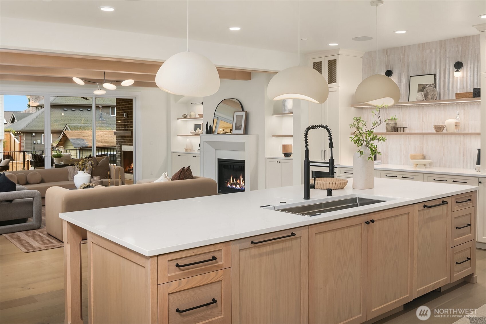 Seamless open-concept layout connecting the kitchen, dining area, and great room, creating effortless flow for everyday living and entertaining.