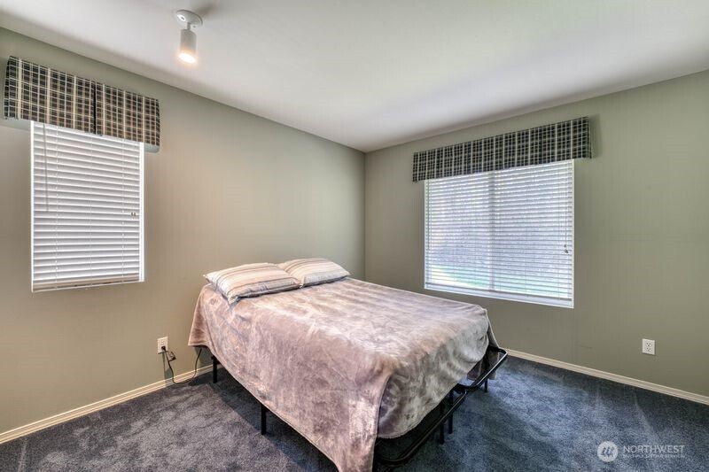 Upper level floor 3 bedroom with both back window and side window.  The advantage of the townhouse being an end unit.