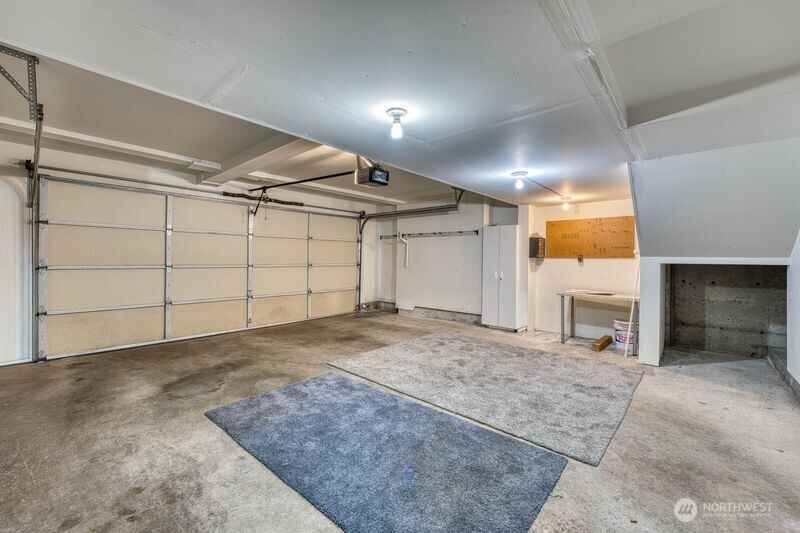 Large double car garage with additional storage.  Drive right in from the street!