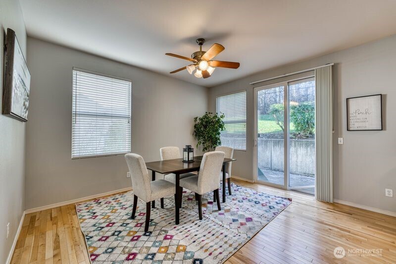 Upper level Floor 2 dining room with sliding door for easy access to the back deck for additional entertainment space.