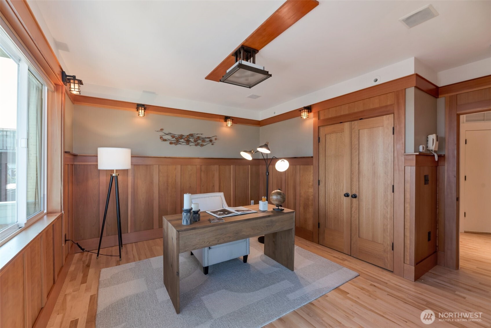 This staging was setup for an office but could also be a guest bedroom