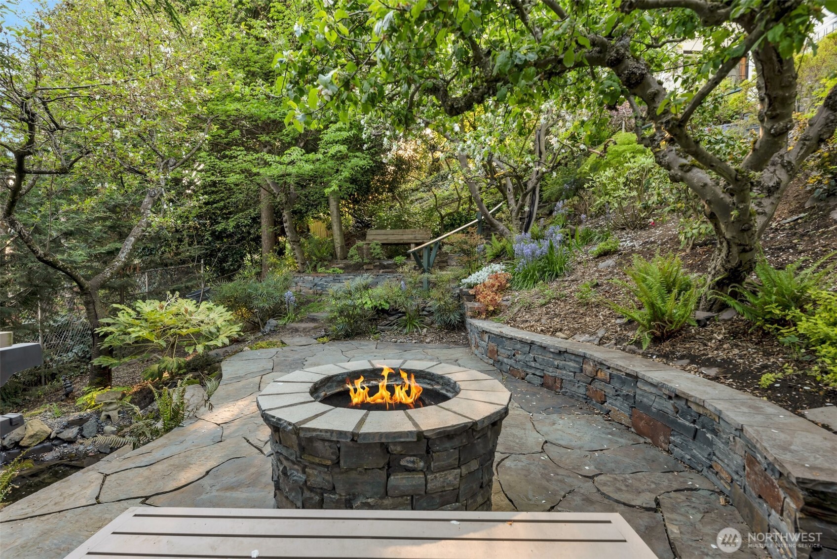 Lower level yard with gas fire oit