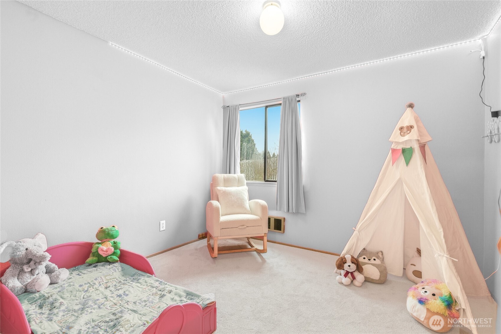 stairway with vaulted ceiling and skylight
