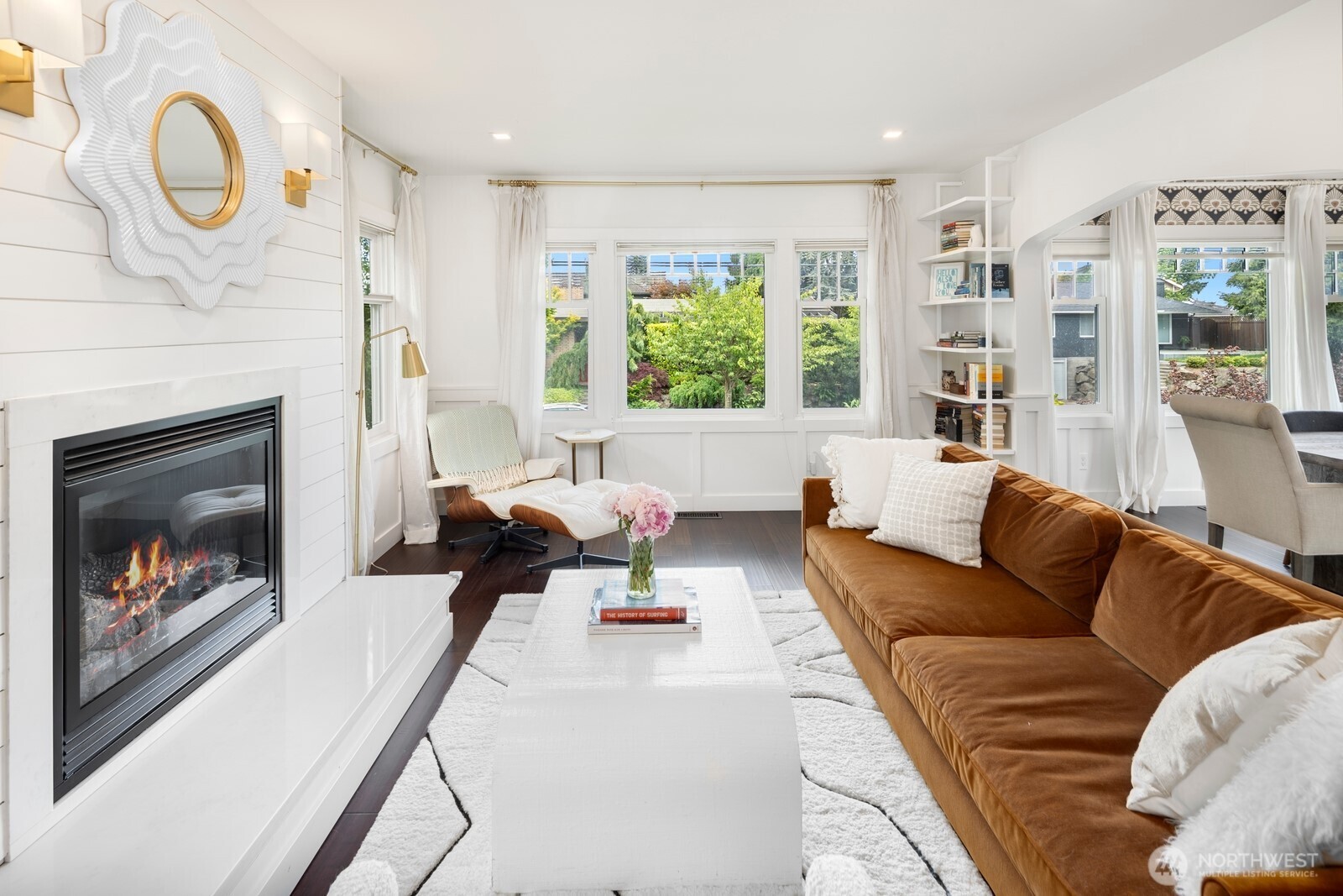 Step inside to a bright and airy main floor featuring a spacious living room & formal dining area.