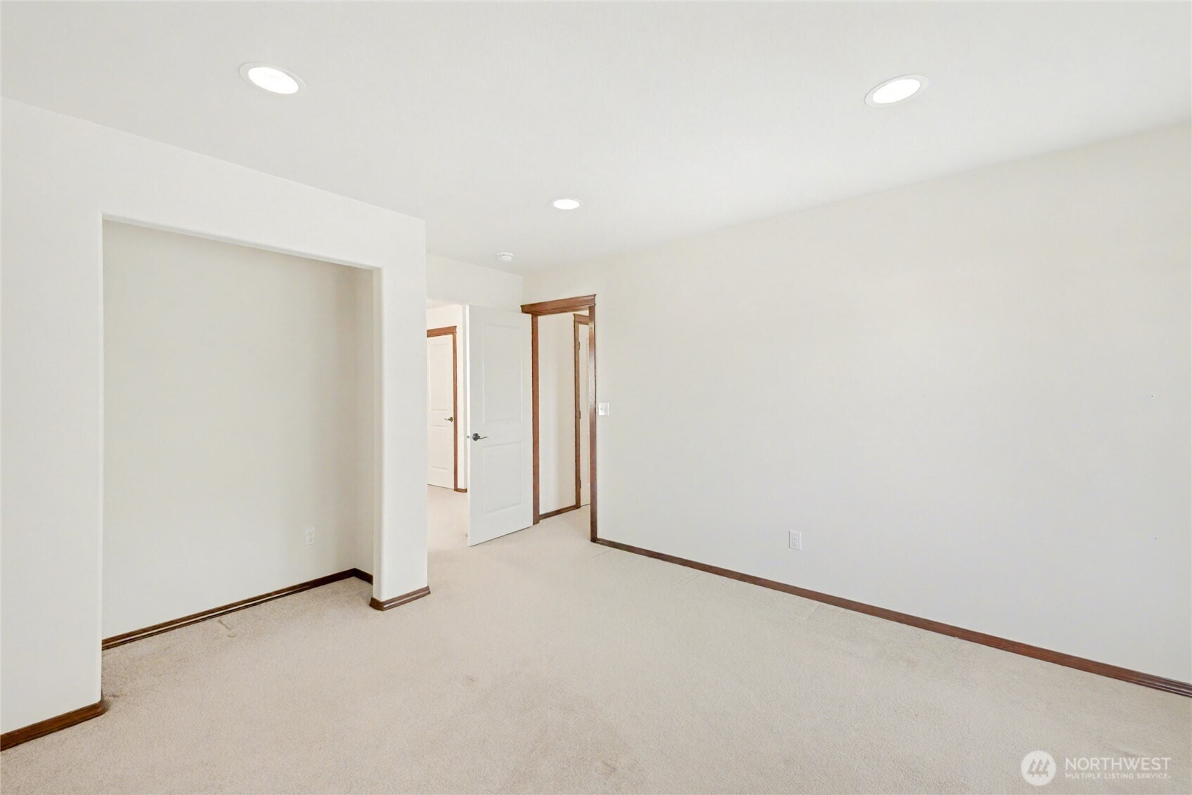 Another view of the 1st guest bedroom highlighting the pass through that adds tons of versatility to this upstairs space.
