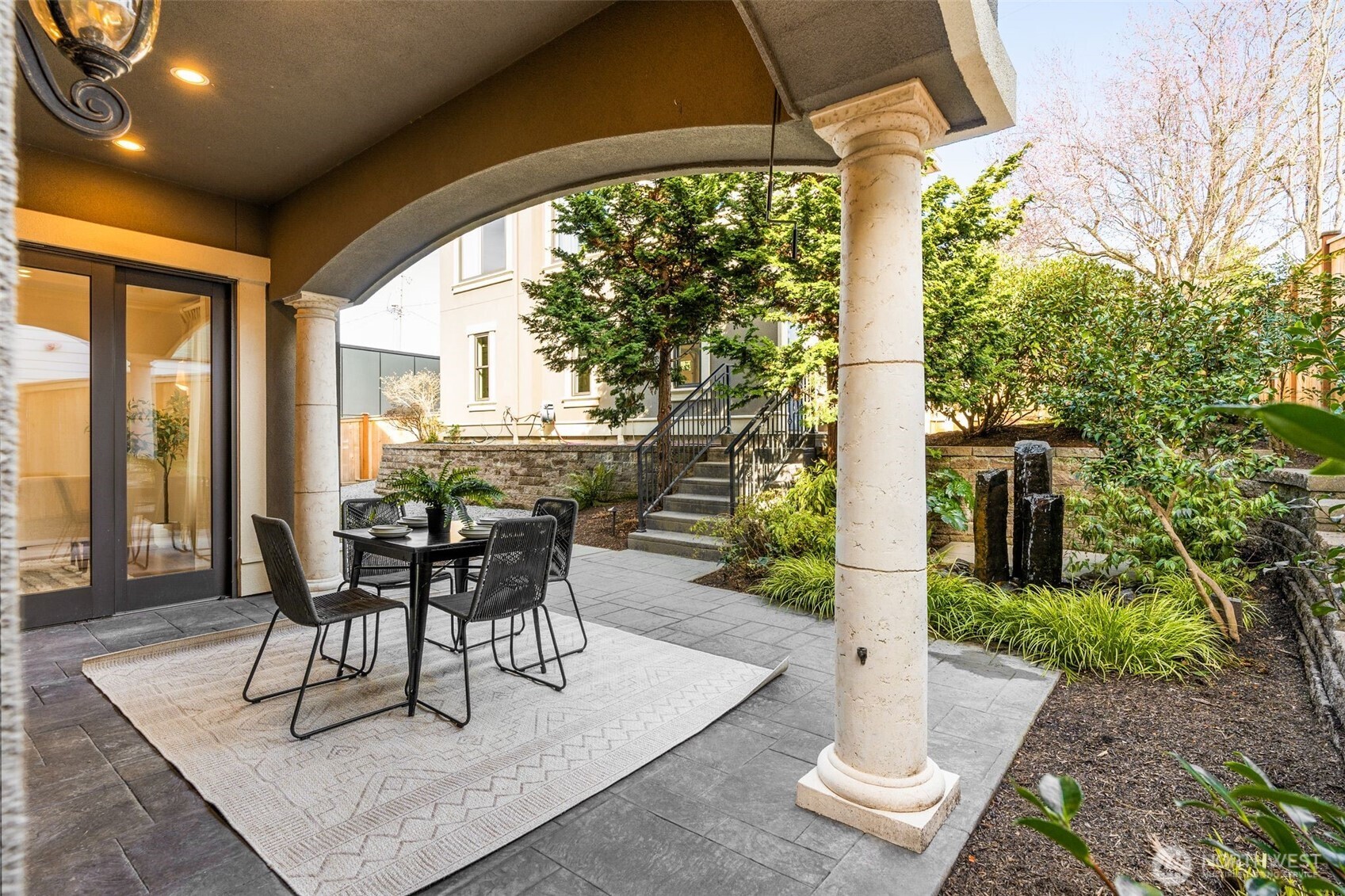 Luxurious powder room adjacent to kitchen and living room.