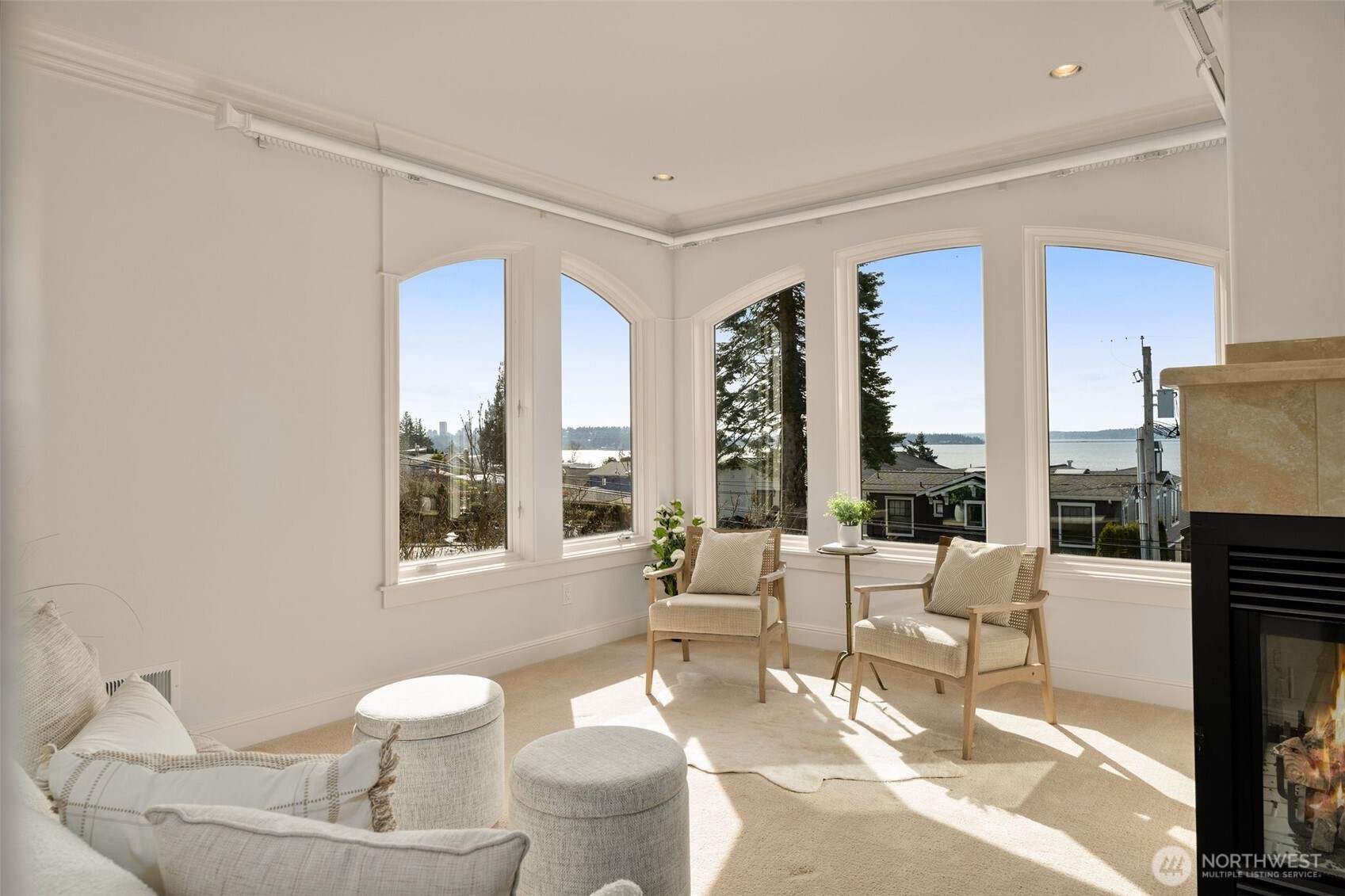 Warming fireplace serves both spaces.