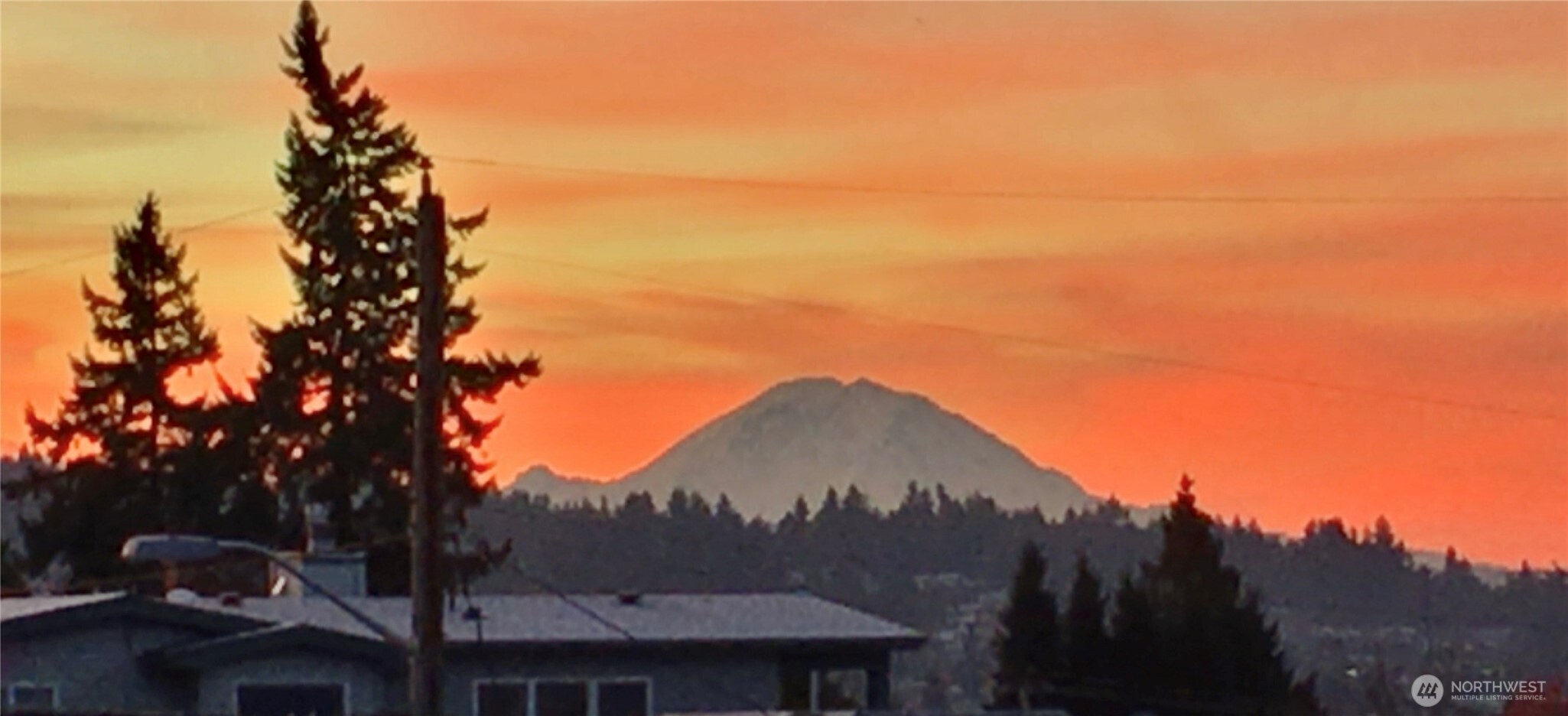 A stunner of a sunset surrounds Mt. Rainier.