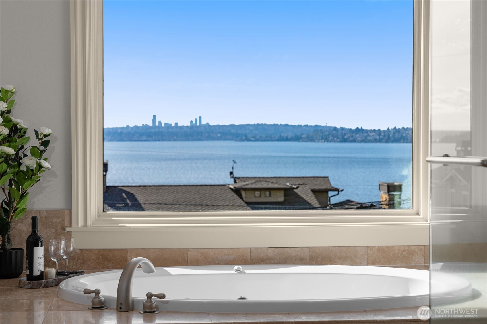 View Balcony with fireplace on main floor.