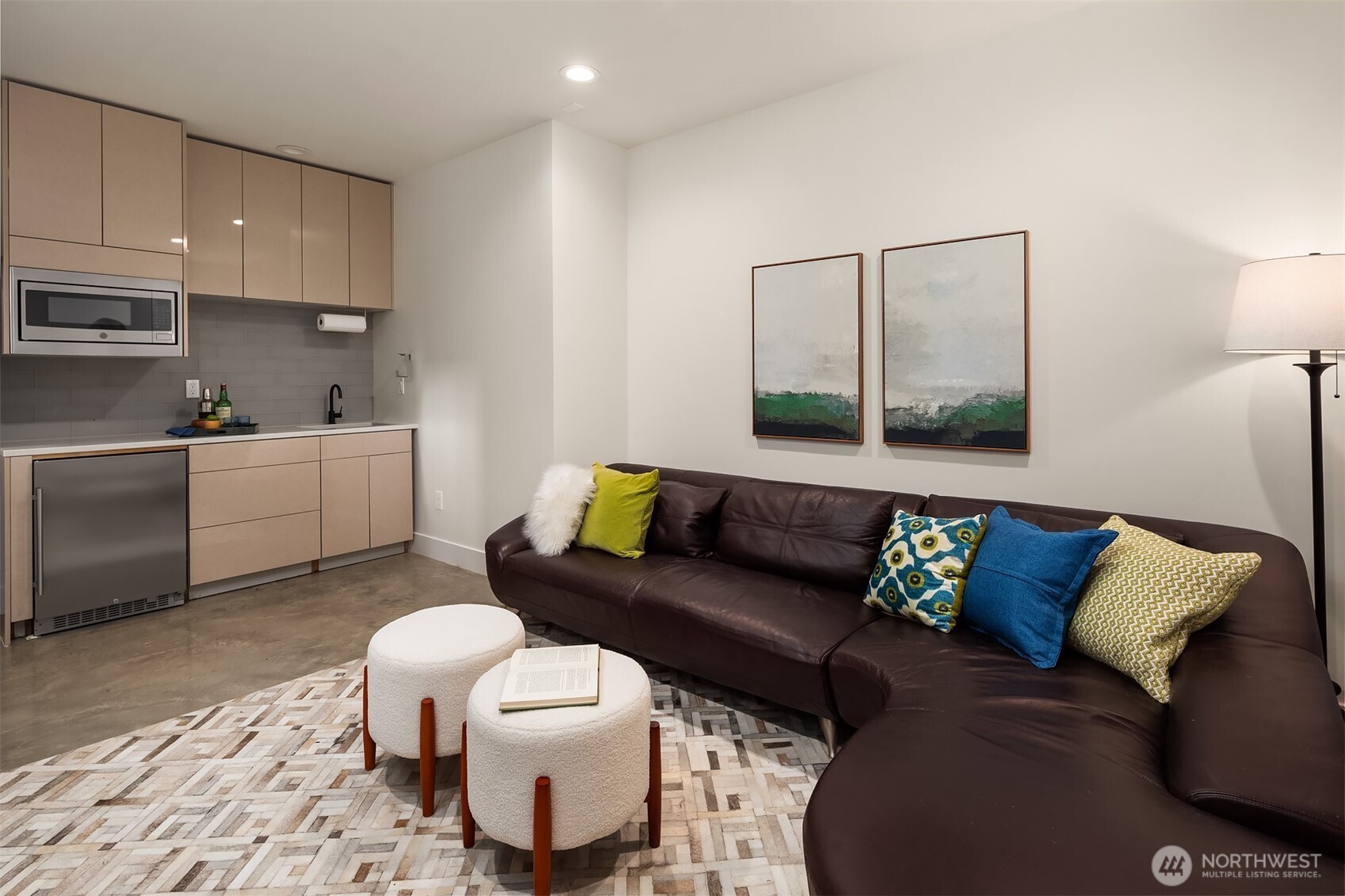 Lower level bonus room or media space with built-in kitchenette