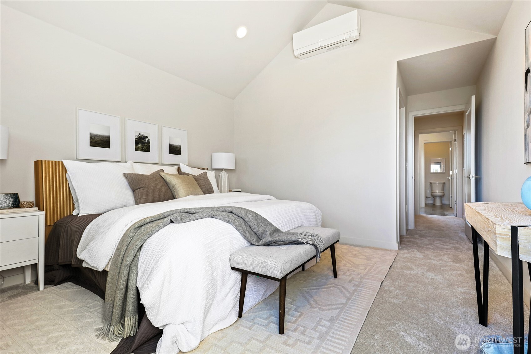 Photos of model home 9752 with similar finishes & floor plan. Another angle of the luxe primary suite—airy, peaceful, and spacious with direct access to your walk-in closet and ensuite bath.