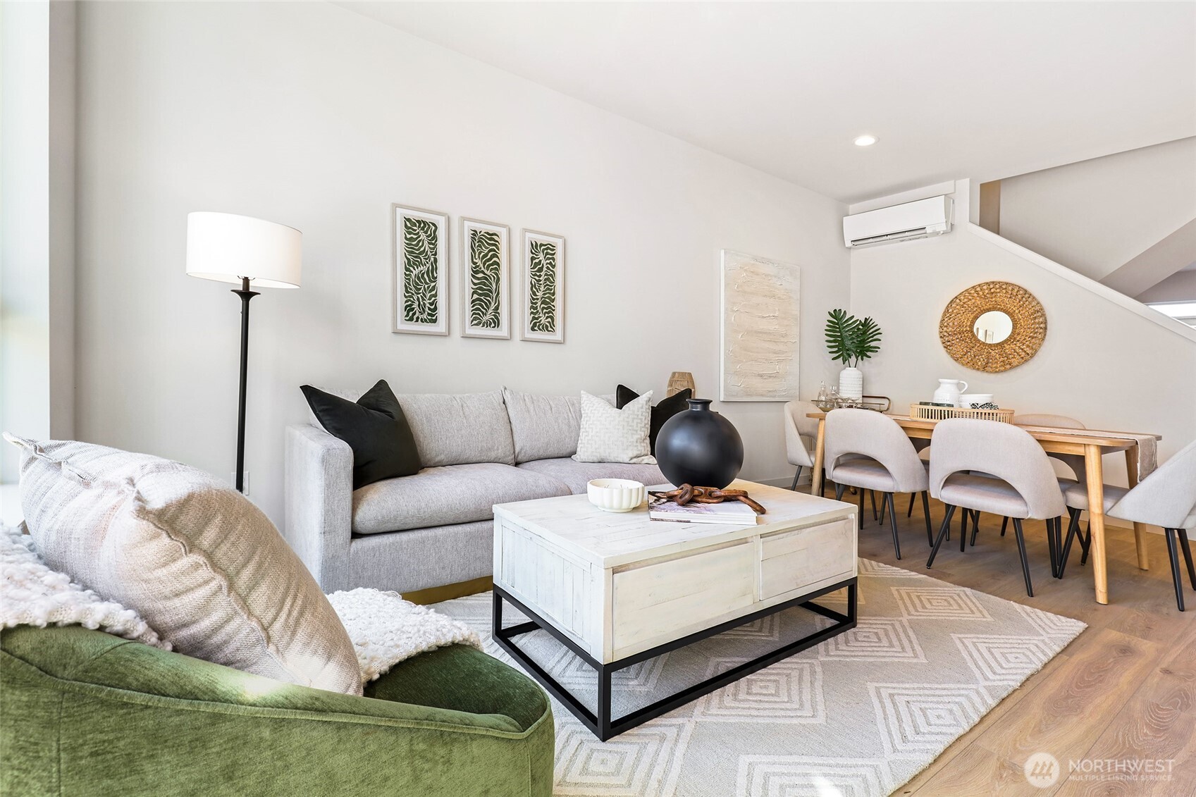 Photos of model home 9752 with similar finishes & floor plan. View from the front of the living room—notice how the layout invites conversation and comfort.