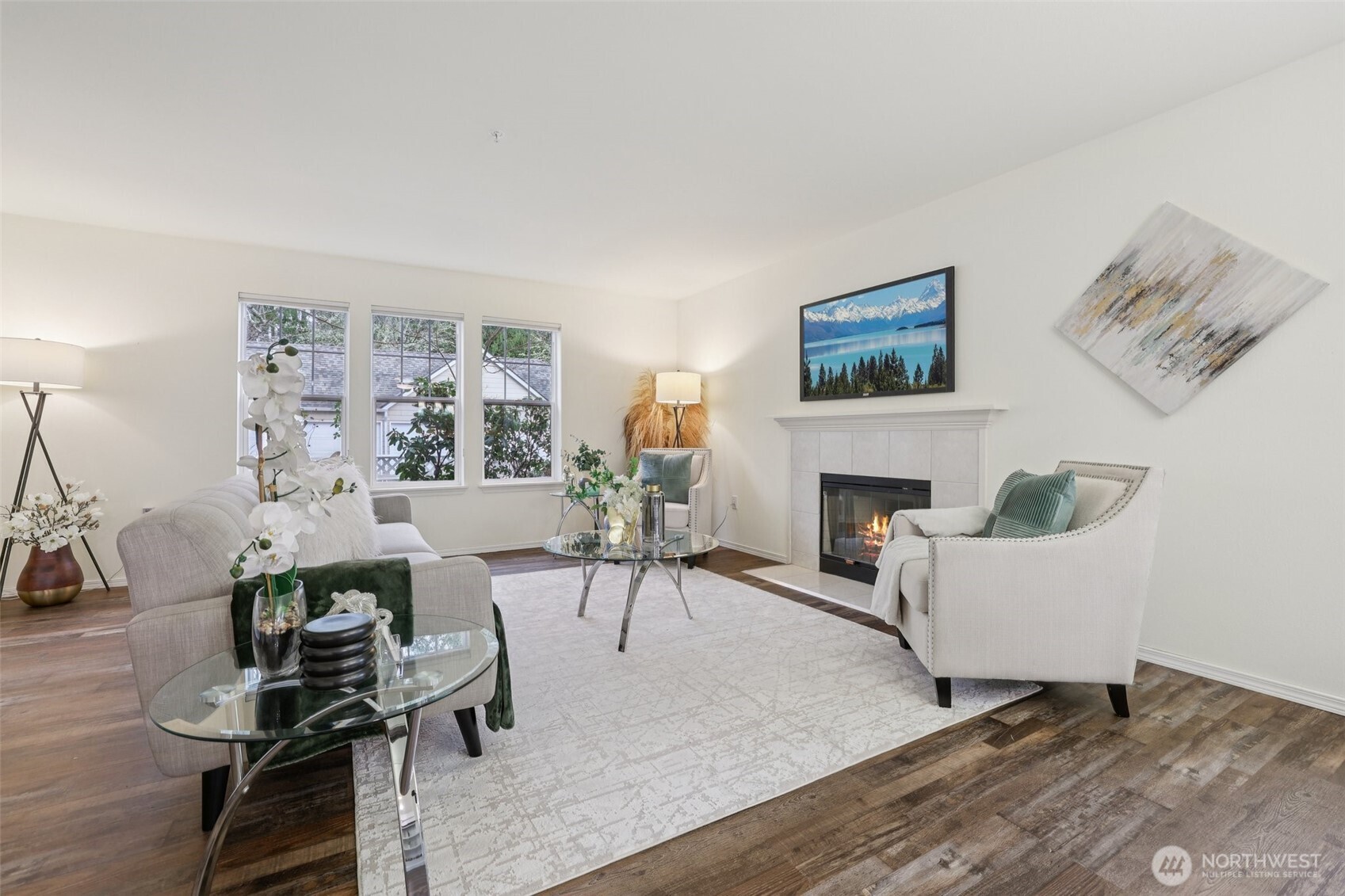 Warm the space with some of your favorite area rugs.