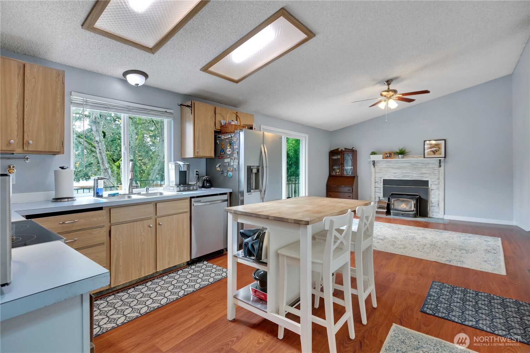 From dining room, take a right into your kitchen, and take a look at the open concept that flows right into the family room.