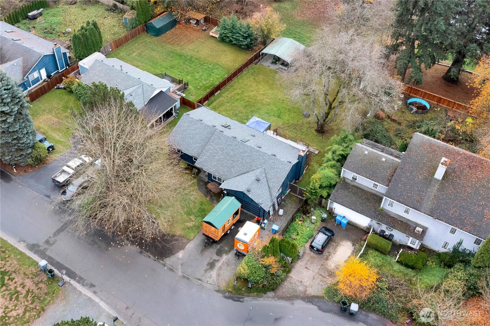 Sky view: front of the home with tree coverage for shade (and great for energy saving purposes year round).