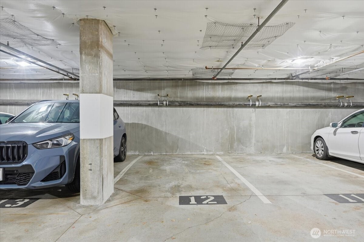 Personal parking space #51 just steps from elevator.