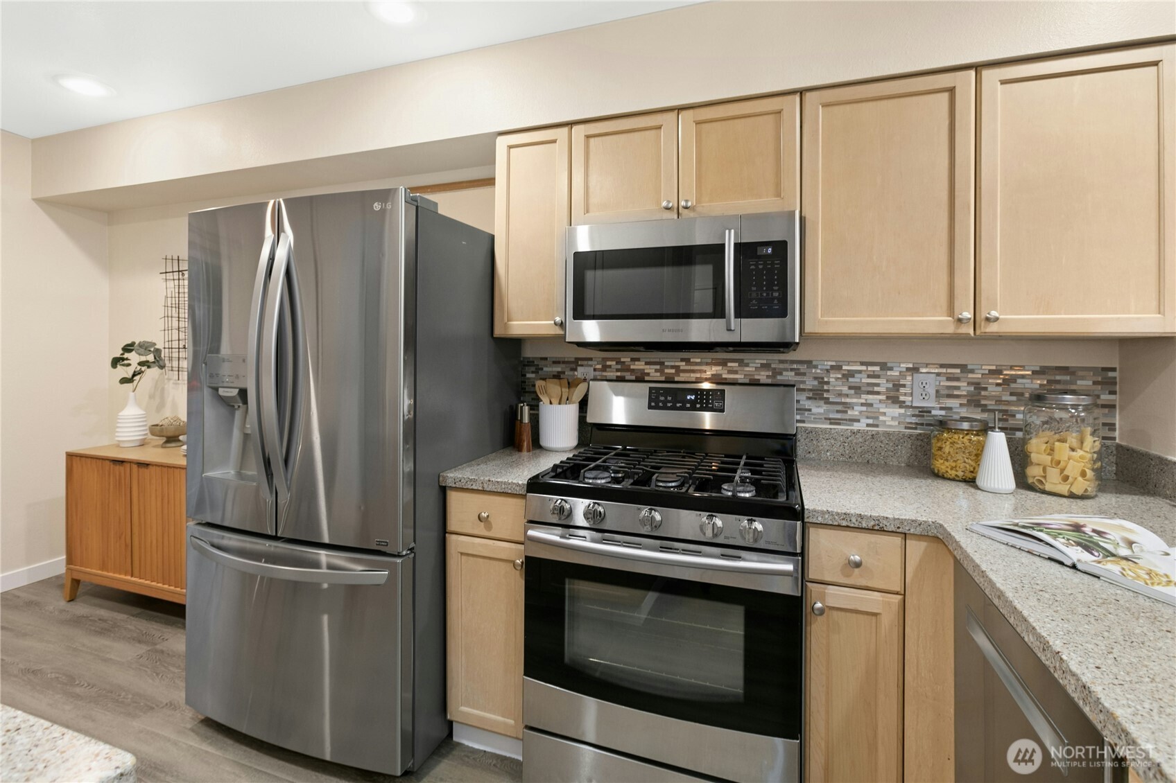 Included in purchase are: refrigerator, microwave, stove/range, washer, dryer, grill and canopy, and mounted TV