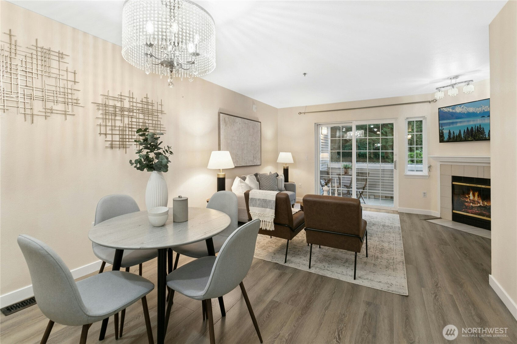 Enter to a large open living room. Gather round the dining table for a warm meal.