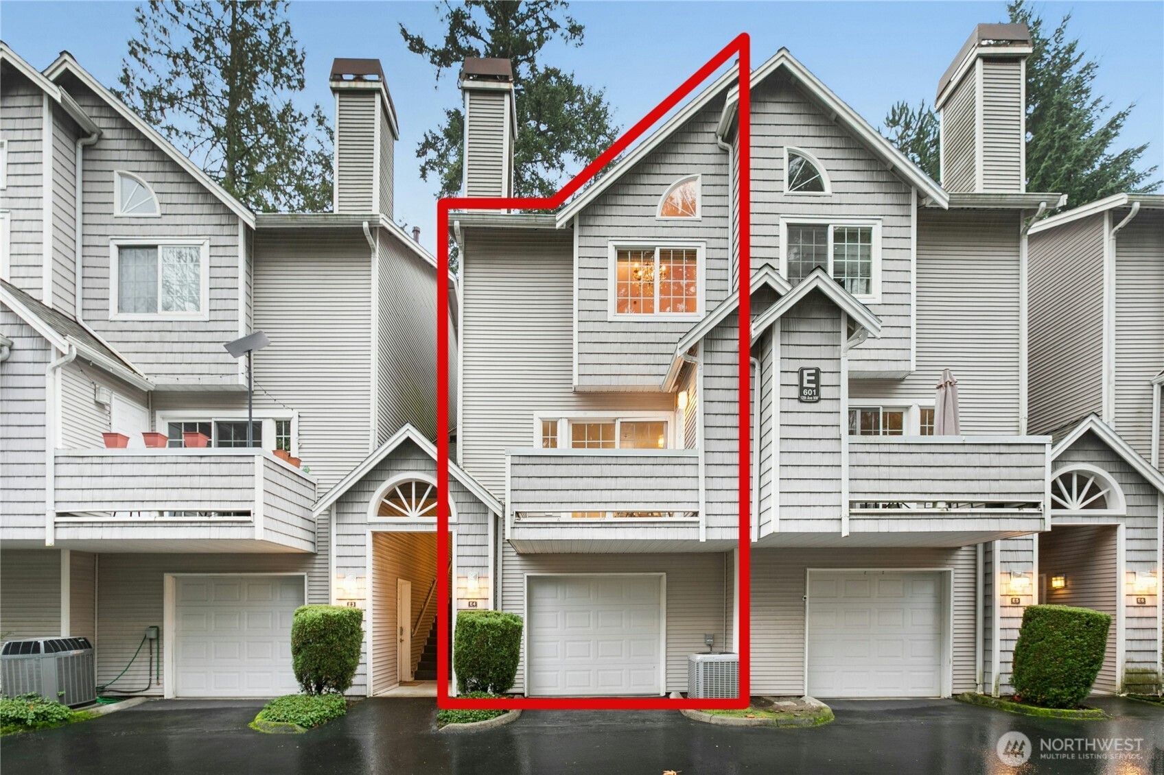 Front view of home, just across the privte drive from your two covered assigned parking spots, and two convenient sared guest spots.