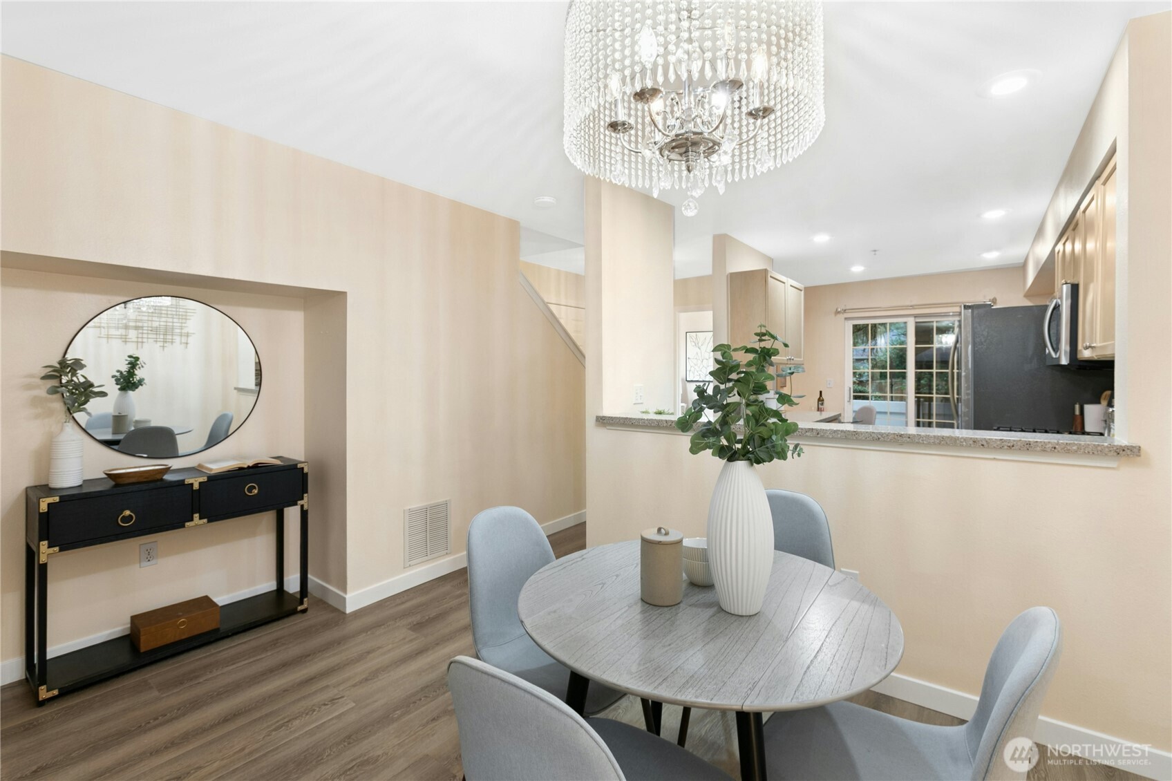 Cook and eat and stay connected through the open wall.