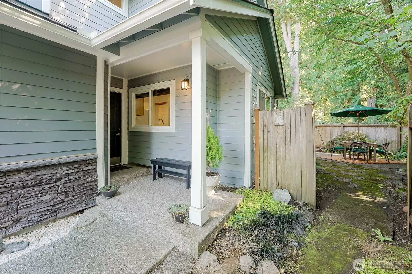Welcome to Nature's Walk. This lovely home has a large landscaped and fully-fenced yard.