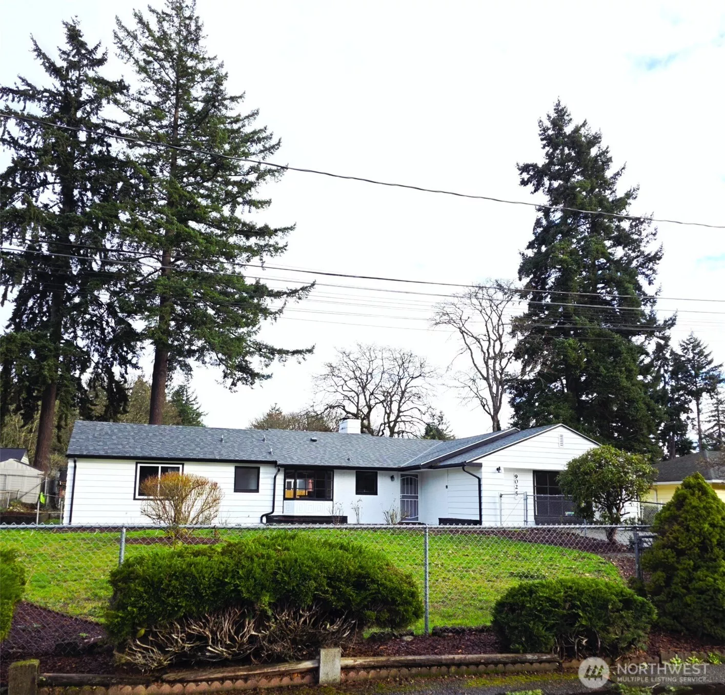 This beautiful Lakewood home for sale features a large, hard to find fully fenced lot.  The primary bedroom also features an additional separate entrance offering flexible uses such as a home office, easy access for shift workers or anything else your imagination comes up with